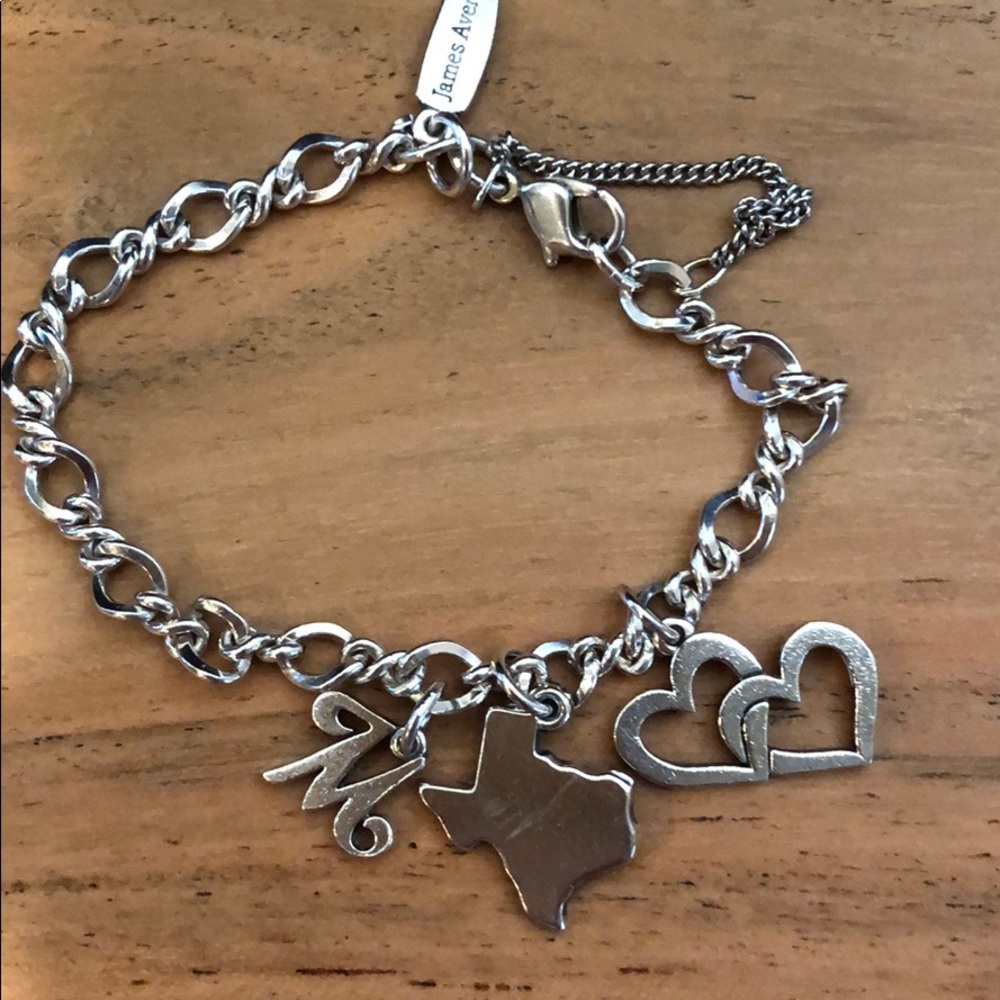 James Avery charm bracelet with three charms
